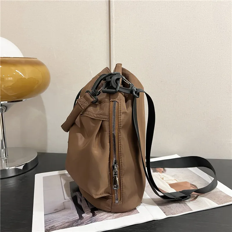 Korean Fashion Nylon Fabric Drawstring Bucket Bag Personalized Versatile Handheld One Shoulder Crossbody Bag for Daily Leisure