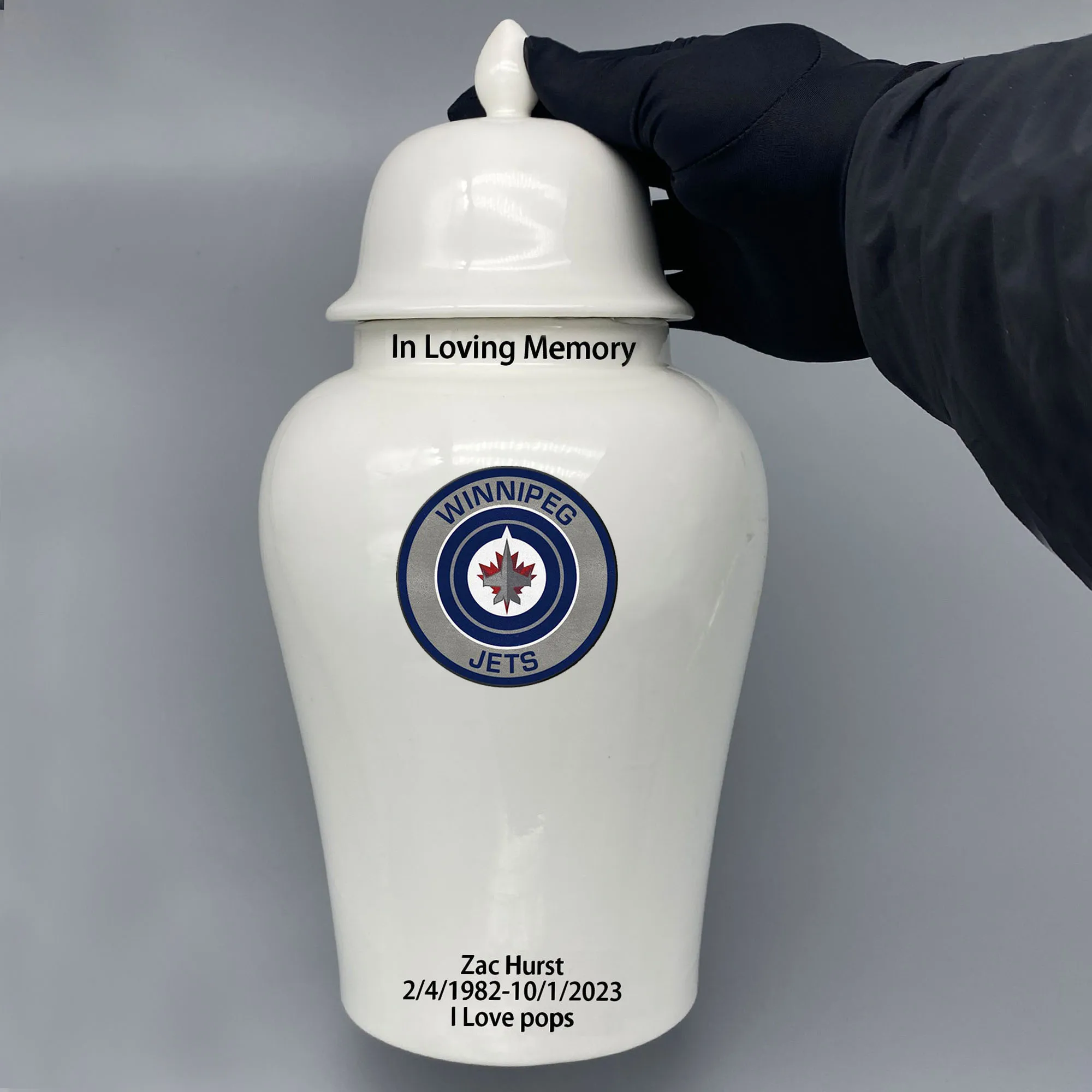 

Large Urn for Winnipeg Jets-themed Hockey Urn.Please send me the customize information-name/date