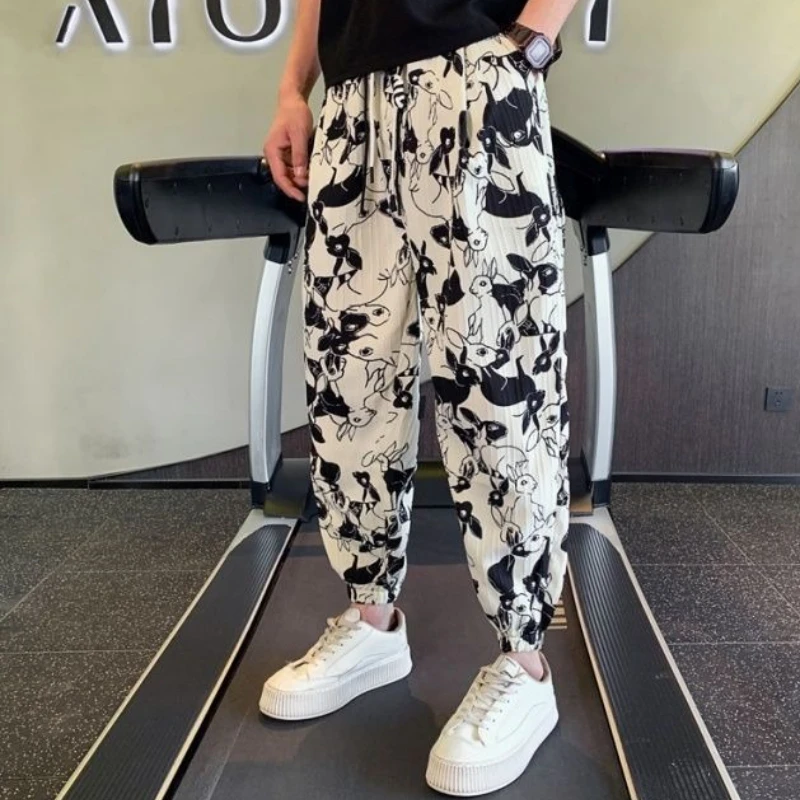 Летние тонкие мужские укороченные брюки из ледяного шелка с принтом, свободные мужские повседневные шаровары, большой размер, дизайнерская оригинальная одежда, дешевые брюки