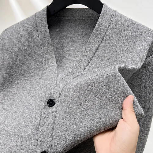 Cárdigan de punto con cuello en V para hombre, suéter de Color sólido con dos bolsillos, abrigo informal para ir al trabajo, otoño e invierno, calidad de diseñador