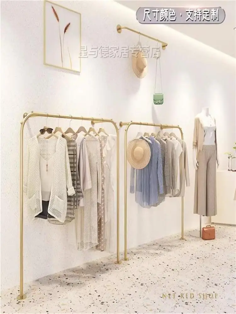 Clothing store display rack hanging on the wall, store shelf display rack minimalist floor to wall rack