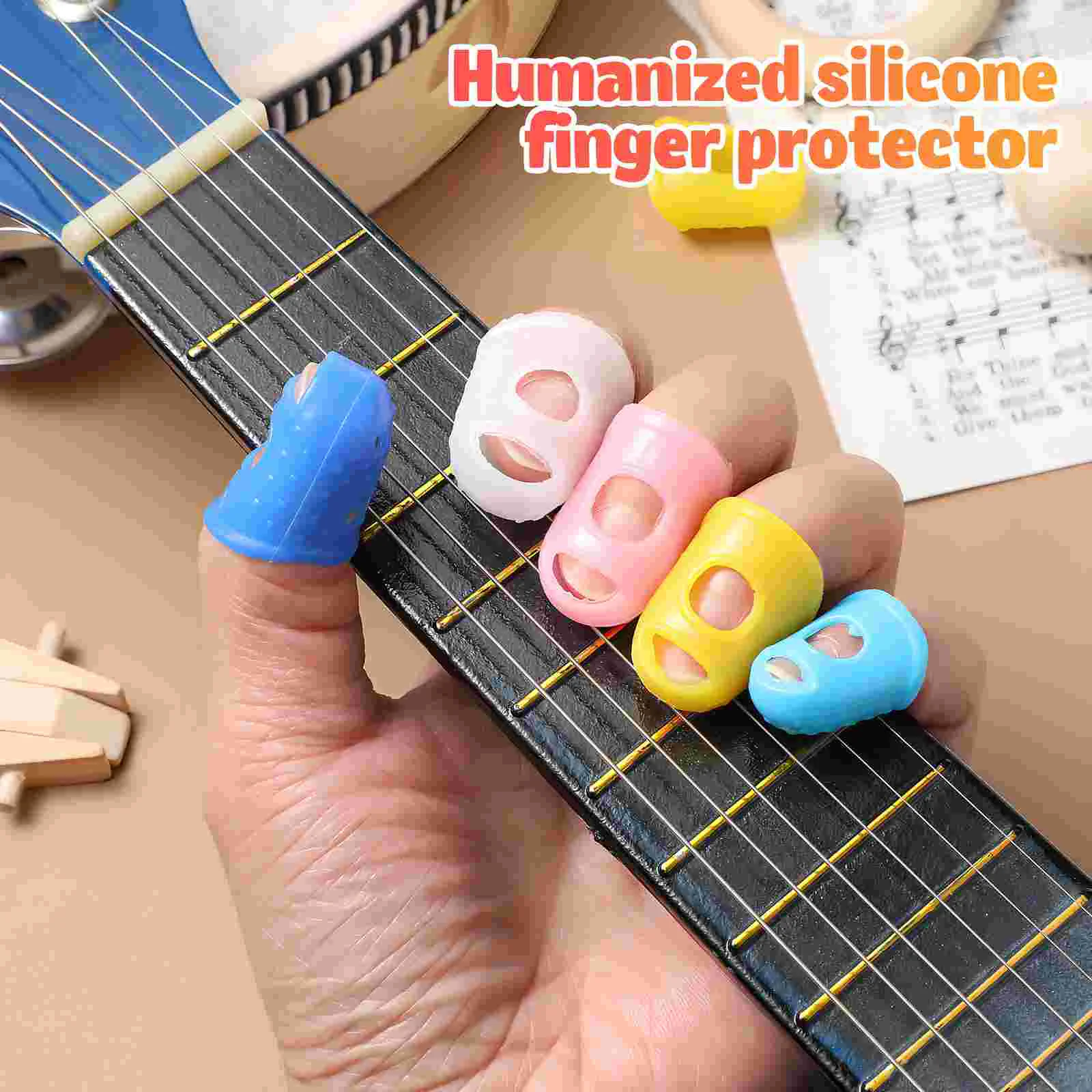 25 Pcs Guitar Finger Protector Cots Fingertip Guard Silicone Sleeve Protectors for