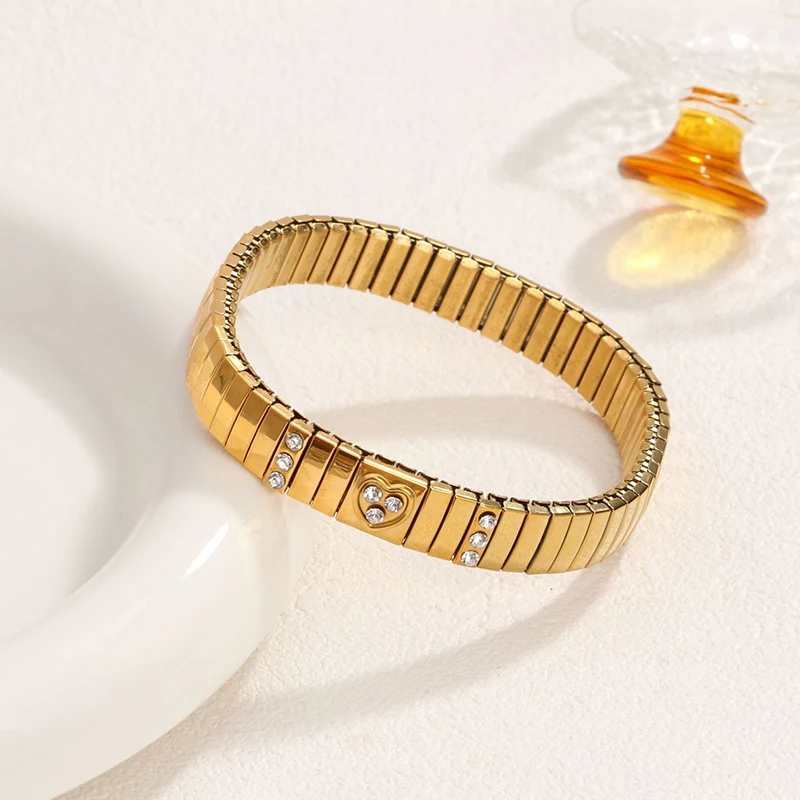 Loe| Women Fashion Stretch Bracelet. Stainless Steel. Heart Pendant. Gold Plated Charms. New