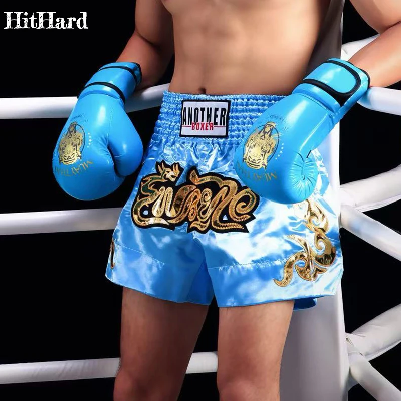 الملاكمة التايلاندية السراويل الرجال سراويل ملاكمة النساء الاطفال الساتان كيك بوكسينغ تصارع التدريب قفص القتال MMA جذوع رياضة الملاكمة السراويل