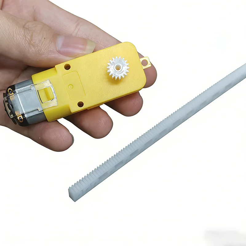 A set including 1 TT gear with 18 teeth and TT hole, 1 L-shaped bent TT motor and 1 125mm long rack