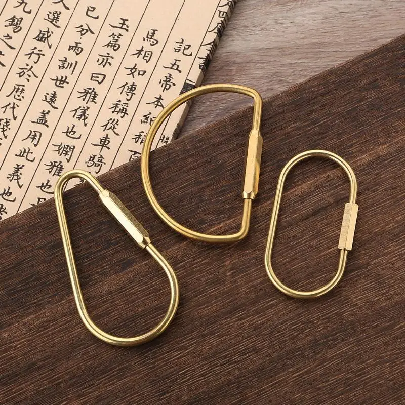Messing-Schlüsselanhänger mit Schloss D-Schlüsselkette Goldfarben Camping-Karabiner Überlebensausrüstung – Detail 1