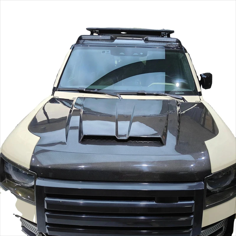 

Капот из сухого карбона для Defender, обновленный стиль SVR