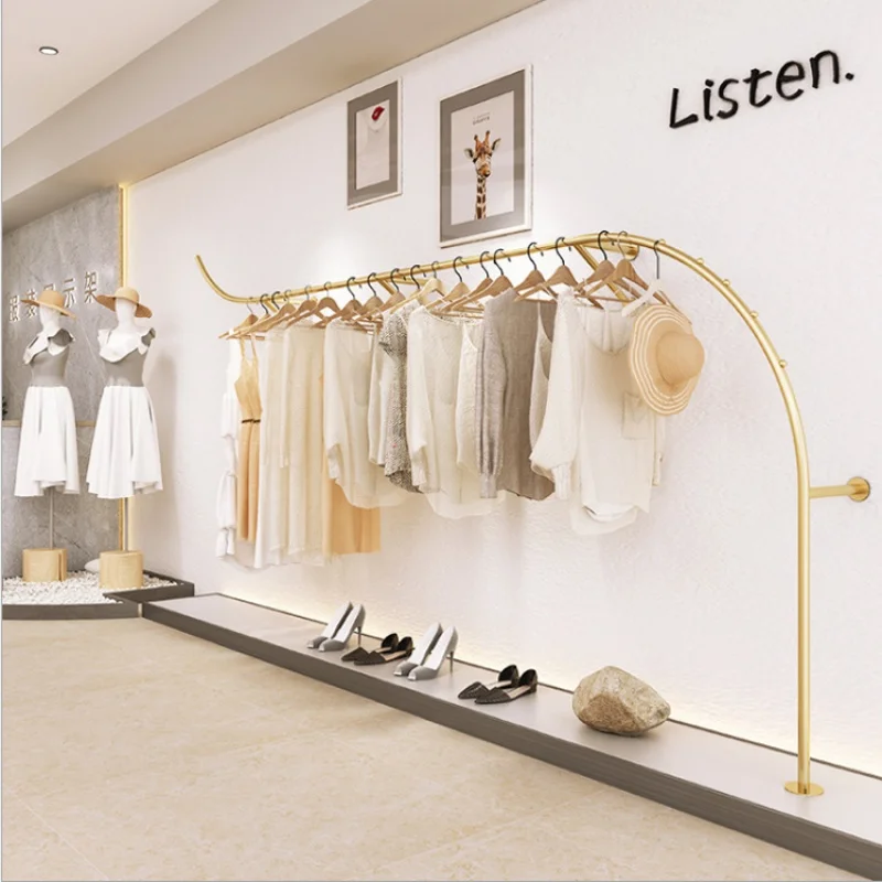 Custom, retail gold clothes shop display wall metal hanging rack interior design furniture fixture