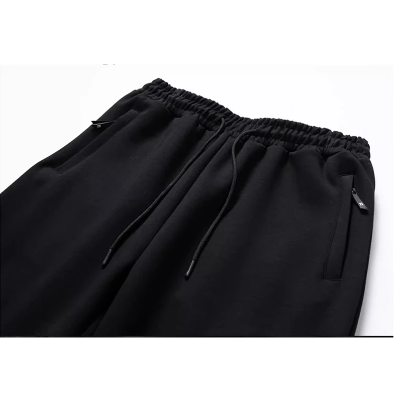 ฤดูใบไม้ผลิและฤดูหนาวกางเกงลําลองผู้ชายกางเกงกีฬาสีทึบหลวมพลัสไขมัน PLUS ขนาดแนวโน้มกางเกงขายาวทุกคู่