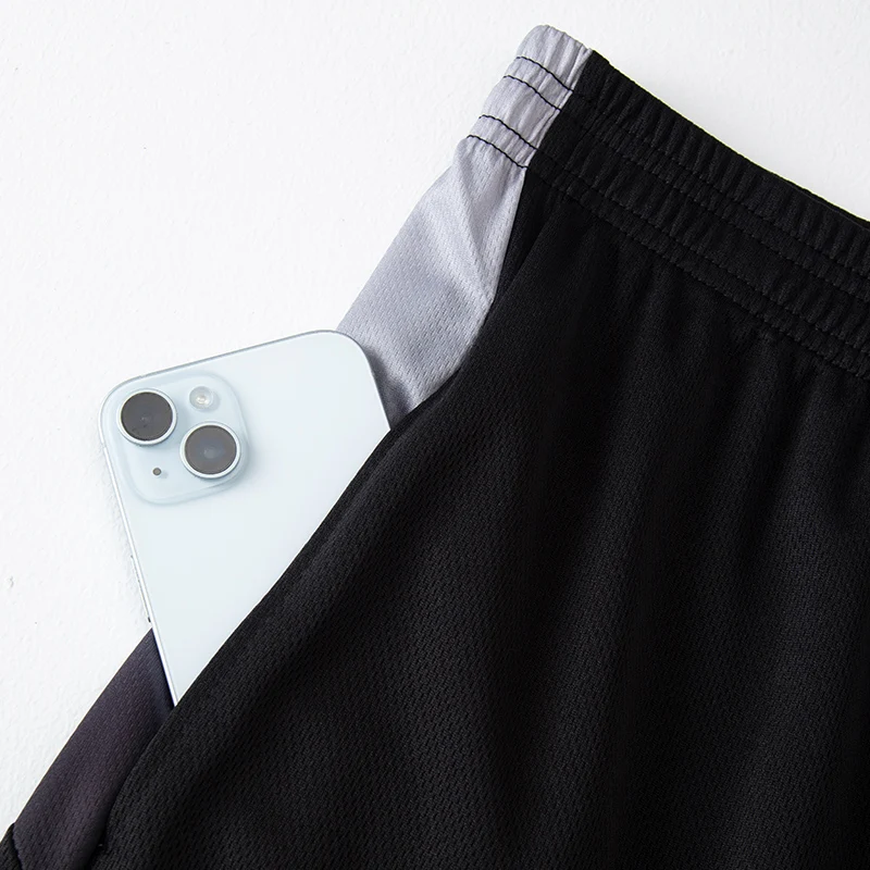 طقم مكون من قطعتين من ملابس عصرية للرجال للربيع والصيف طقم شورت رياضي سريع الجفاف بأكمام قصيرة وسراويل جيب رياضية غير رسمية