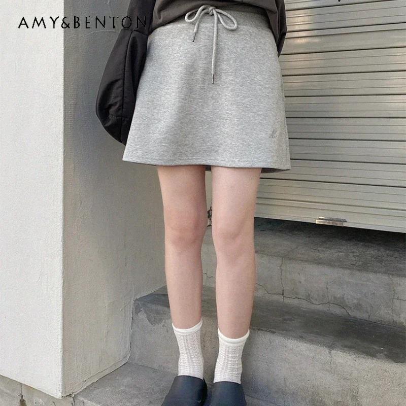 

2024 New Solid Color A-Line Waist and Thin High Gram Weight Drawstring Short Skirt with Its Own Safety Pants For Women