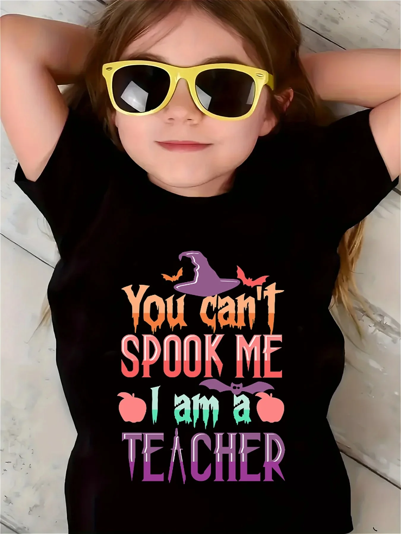 

Halloween girl's T-shirt you can't spooky me I am a teacher letter printed casual and fashionable round neck short sleeved top