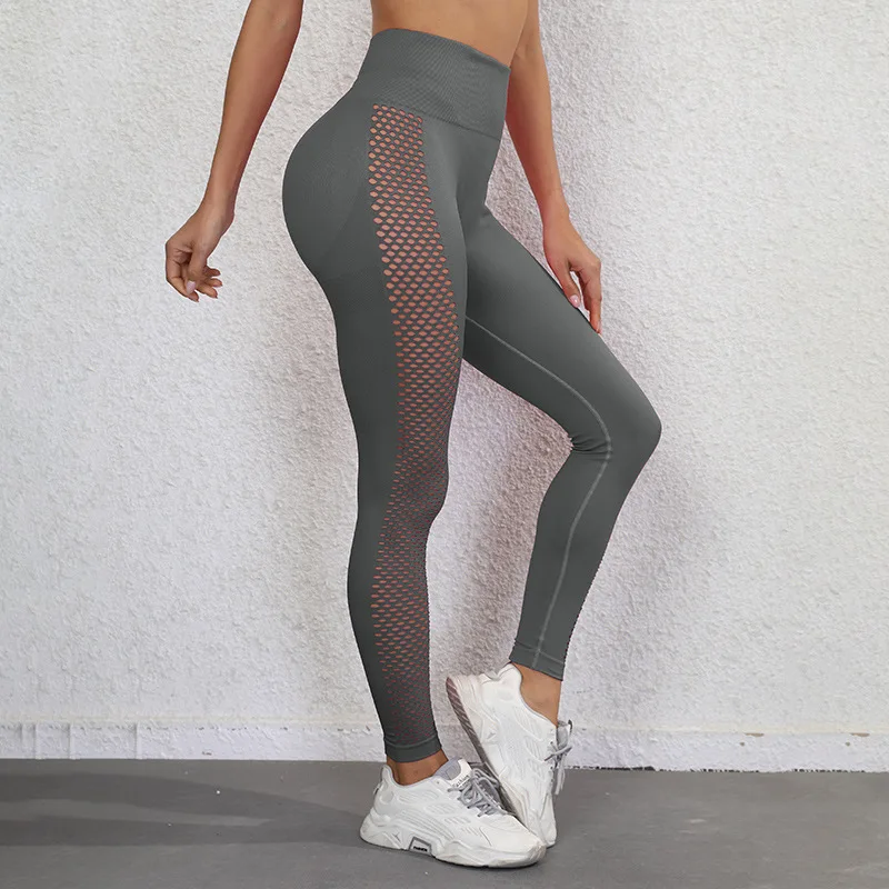 Leggings da Yoga senza cuciture abbigliamento sportivo da palestra per donna Push Up Mesh scava fuori i pantaloni da corsa da allenamento a vita alta