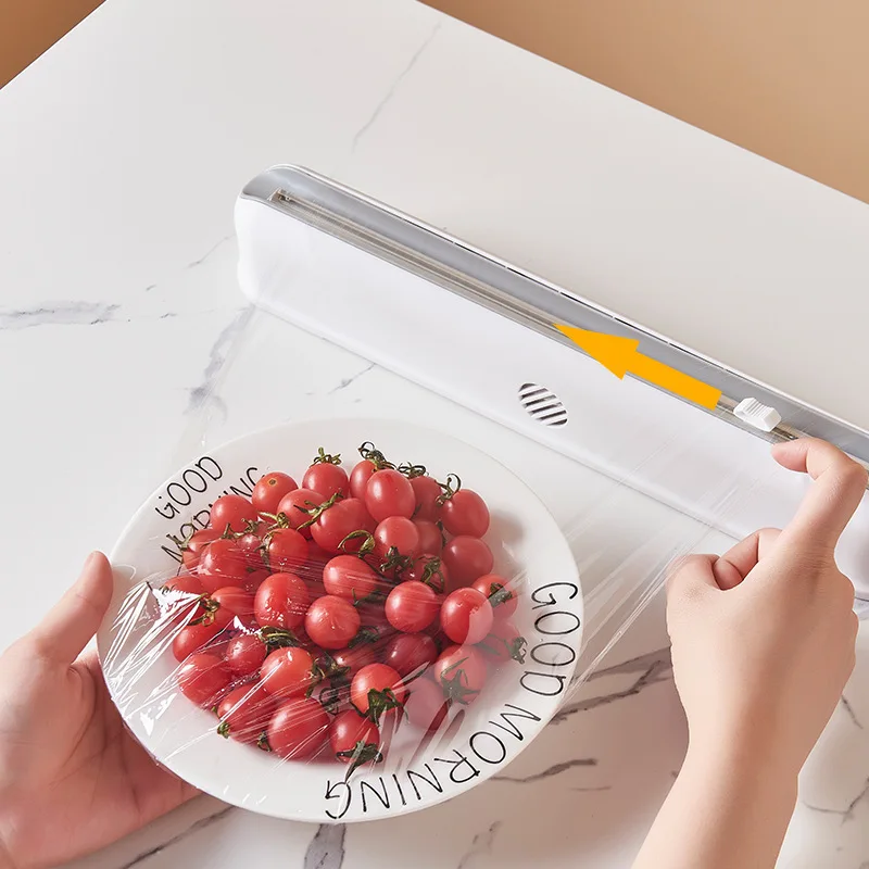 2026 hot Plastic film cutter suction cup wall-mounted plastic film cutting box kitchen divider adjustable storage cutter
