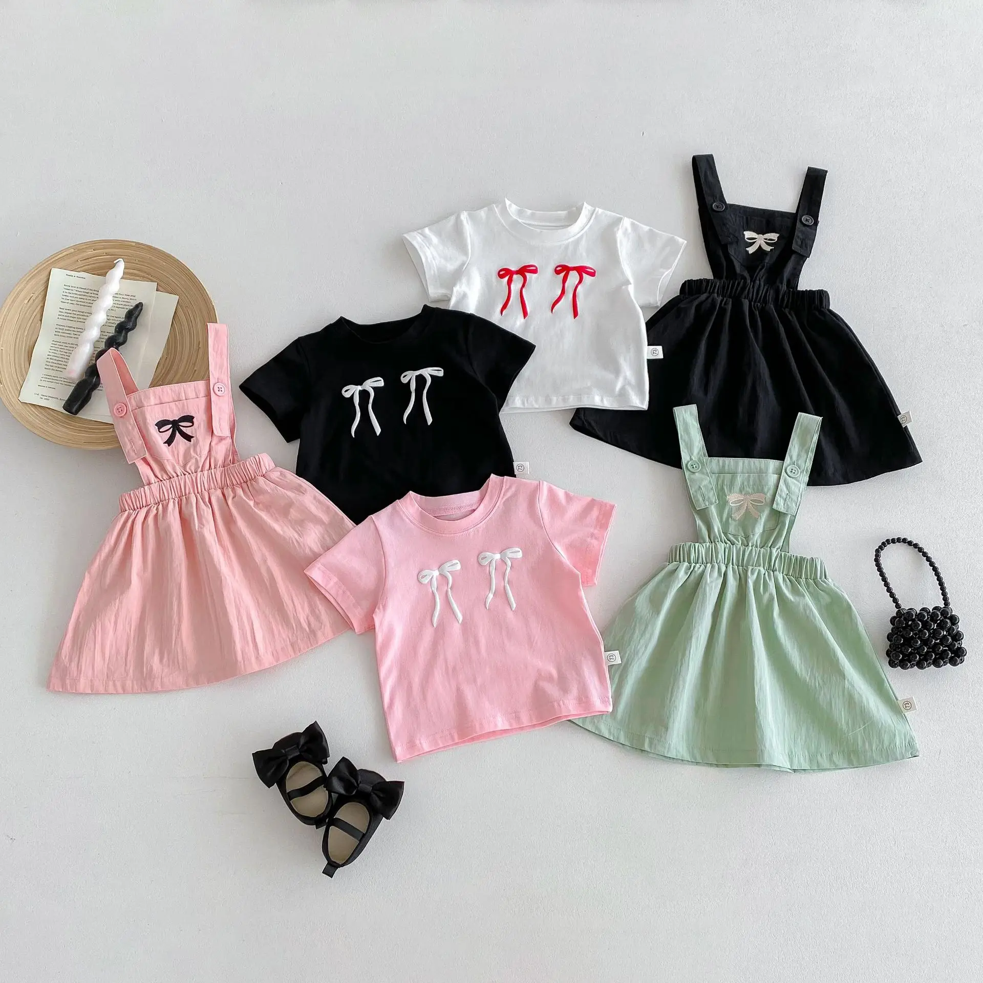 

T-Shirts New Korean Camisole Skirt Two Pieces Fashion Lovely Baby Camisole Skirt Bow Knot Short Sleeved Tops Solid 2024