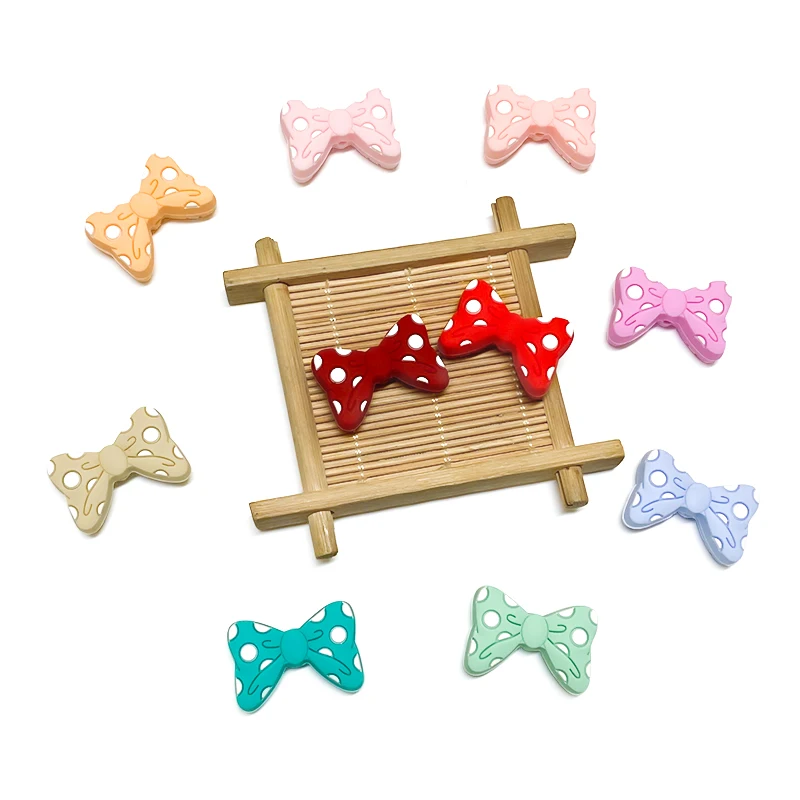 10 stücke Baby Silikon Perlen Neue Fliege Perlen BowKnot Perlen Beißring Baby Spielzeug DIY Schnuller Kette Halskette Zubehör