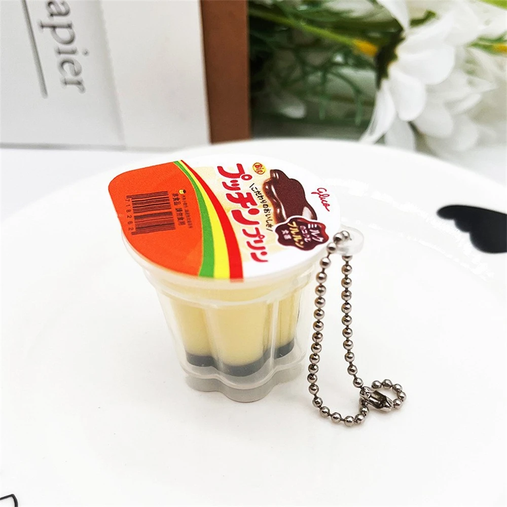 LLavero de gelatina de pudín japonés creativo para mujer, divertido juguete de comida simulada, bolso de coche para chicas jóvenes, llavero colgante, joyería N923