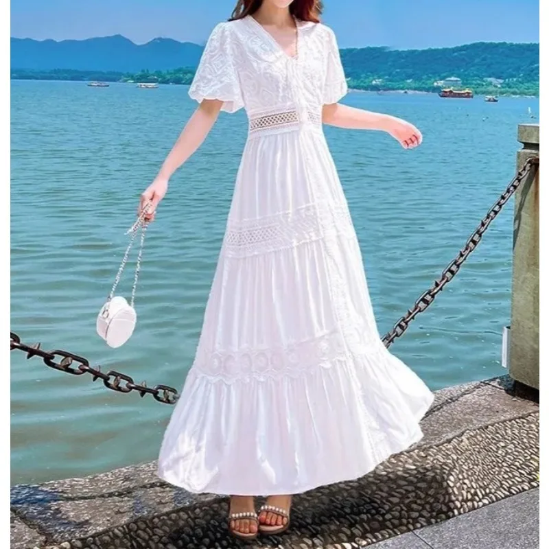 Robe longue blanche à manches bulles françaises, populaire, printemps et été, robe de plage, jupe de voyage, 2026