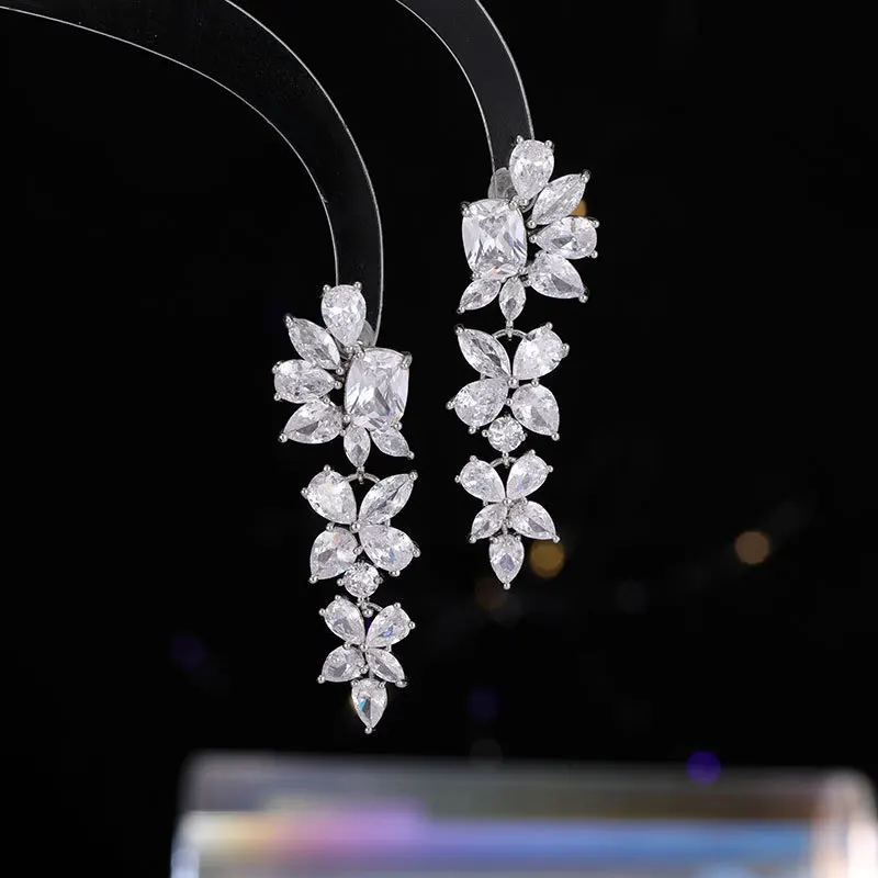 

New petal-shaped tassel stud s925 silver needle irregular zircon versatile earrings for women