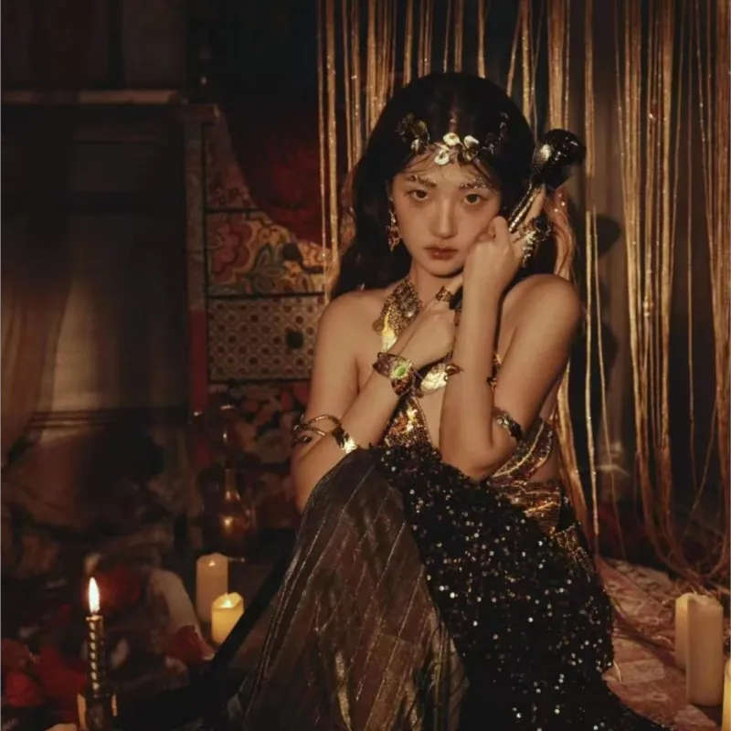 A new style of exotic travel photography with golden top starry chiffon pleated skirt