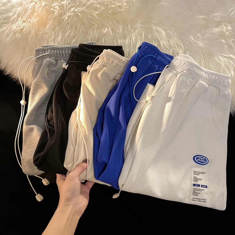 

Summer New Men's Spor orts Five-Quarter Loose Fit Hong Kong Sle Casual Pants Polyester Fiber 00% Comfortable orts