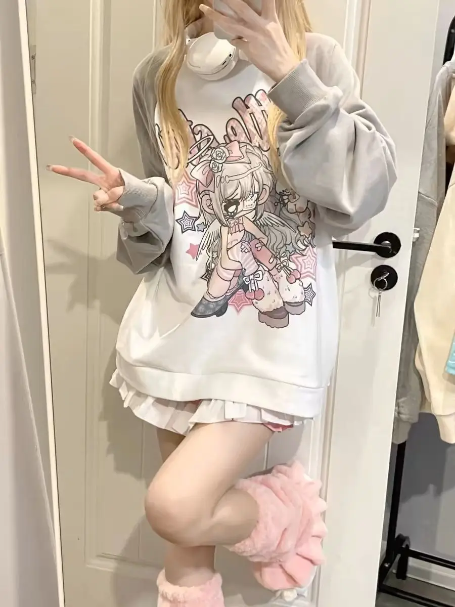 Camicetta a maniche lunghe stampata con cartoni animati giapponesi T-shirt Y2K dolce e ampia Top da donna anime