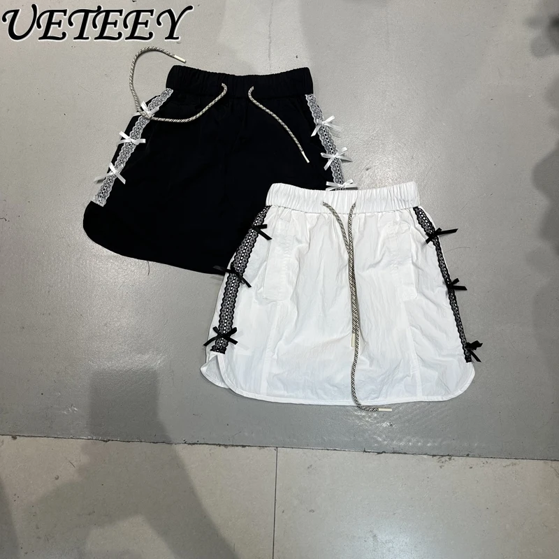 صيف جديد متعدد الاستخدامات الرباط مرونة عالية الخصر حافة الشريط تصميم تنورة قصيرة القوس المضادة للضوء بطانة ألف كلمة التنانير الصغيرة