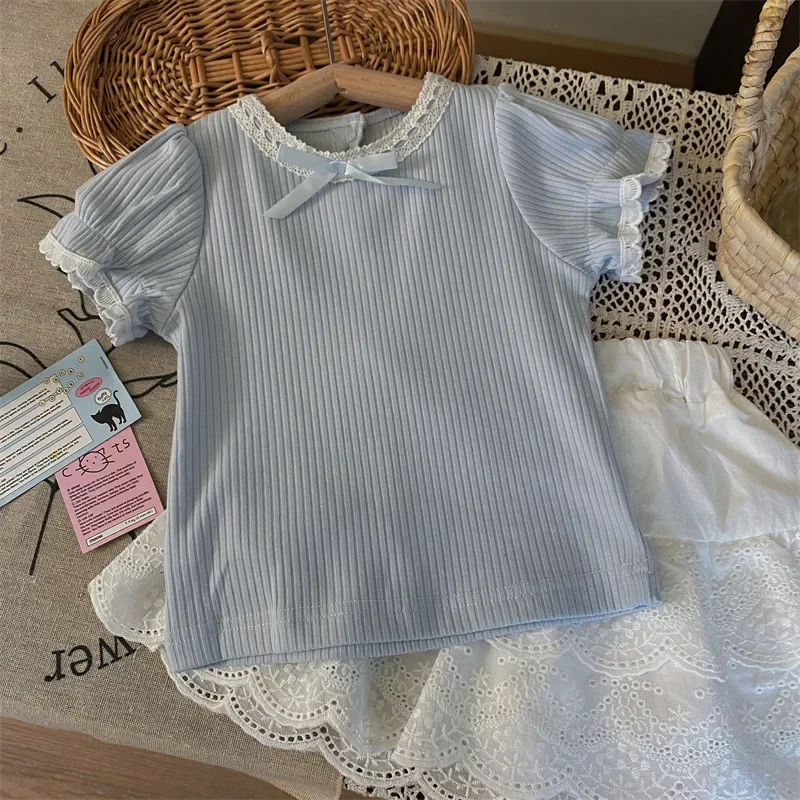 Abbigliamento per bambini Gonna di pizzo coreana Set di due pezzi di moda 2025 Nuova maglietta con maniche a palloncino per ragazze estive e set di