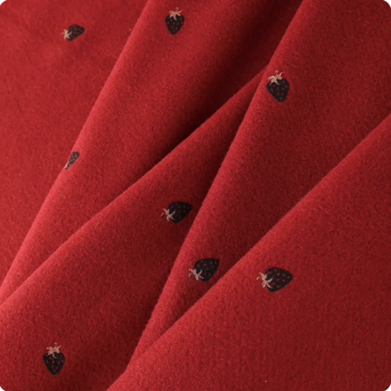 

Ins strawberry-printed red woolen polyester fabric for autumn and winter coat, children's clothing cape, DIY clothing fabric
