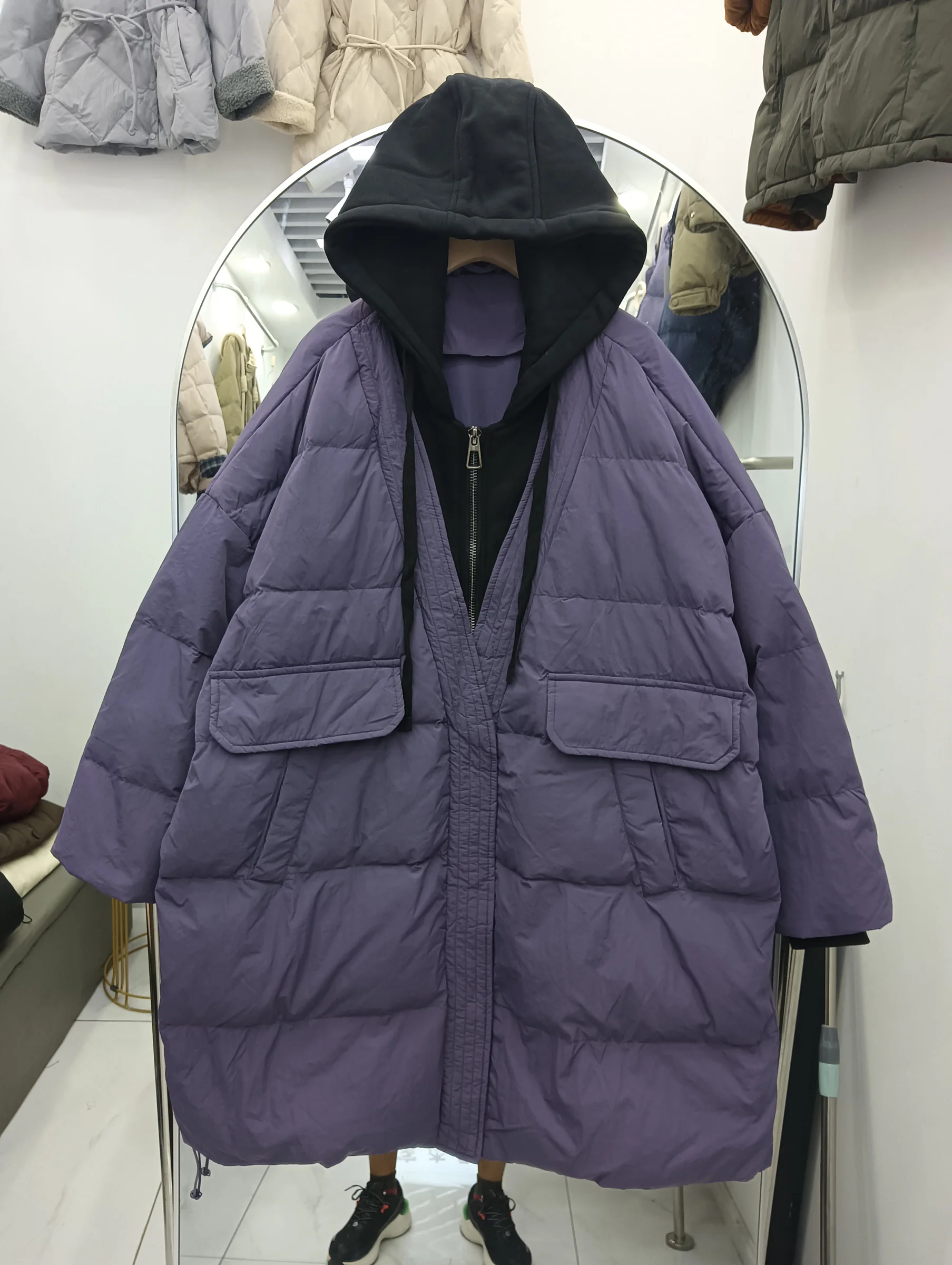 سترة نسائية جديدة موديل 2025 متوسطة الطول بقلنسوة كورية من Jaet ملابس خارجية حرارية من ريش الدفء باللون الأبيض