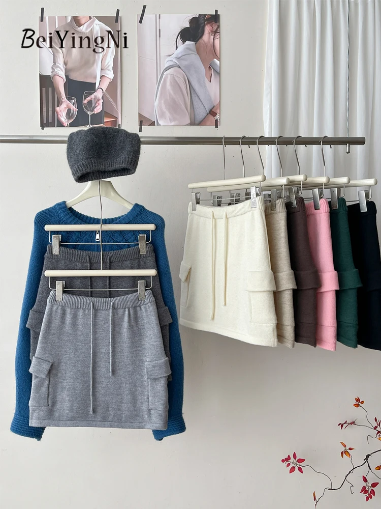 Beiyingni nova moda de malha cintura elástica mini saia feminina coreano bolsos lápis saias curtas senhora simples inverno magro jupes