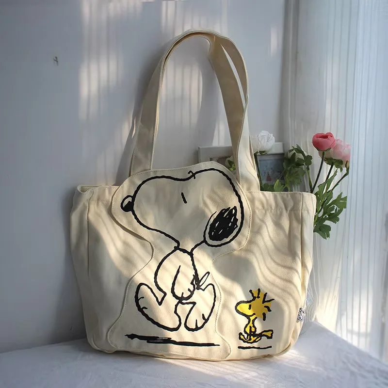 กระเป๋าผ้าใบผู้หญิงความจุสูงกระเป๋าแฟชั่นการ์ตูน Snoopy กระเป๋าถืออเนกประสงค์หนึ่งไหล่ Tote กระเป๋าเดินทางกระเป๋า