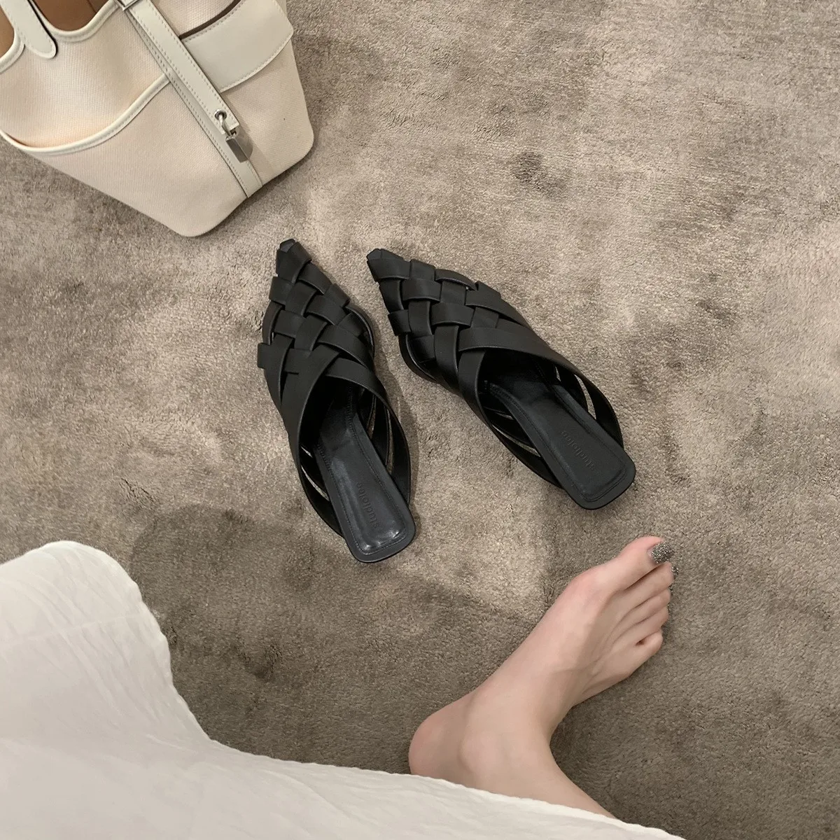 

Slippers 2026 Summer Baotou pointed half slippers women's flat bottomed sandals woven hollow sandals