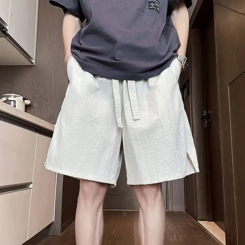 

Летние тонкие быстросохнущие брюки с пятью точками, мужские трендовые универсальные повседневные шорты, свободные американские спортивные пляжные брюки