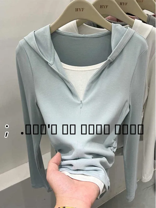 

Весна 2025: Модный женский топ с капюшоном в корейском стиле, имитация двухслойности, плиссированный подол, длинный рукав, трендовый дизайн