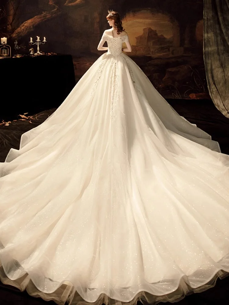 Romantic Off Shoulder Rhinestone Beaded Bridal Gown Sparkle Tulle Super Long Train Corset Wedding Dress Robe De Mariee Custom