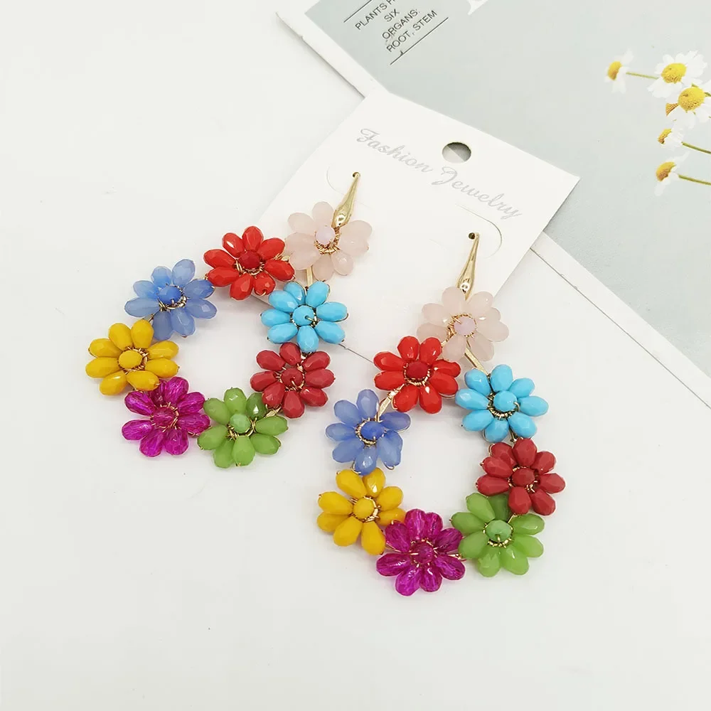 Beaded earrings Water drop Flower Originality Hand knitting Crystal Bohemia Tide Simple Alloy Rice bead earrings