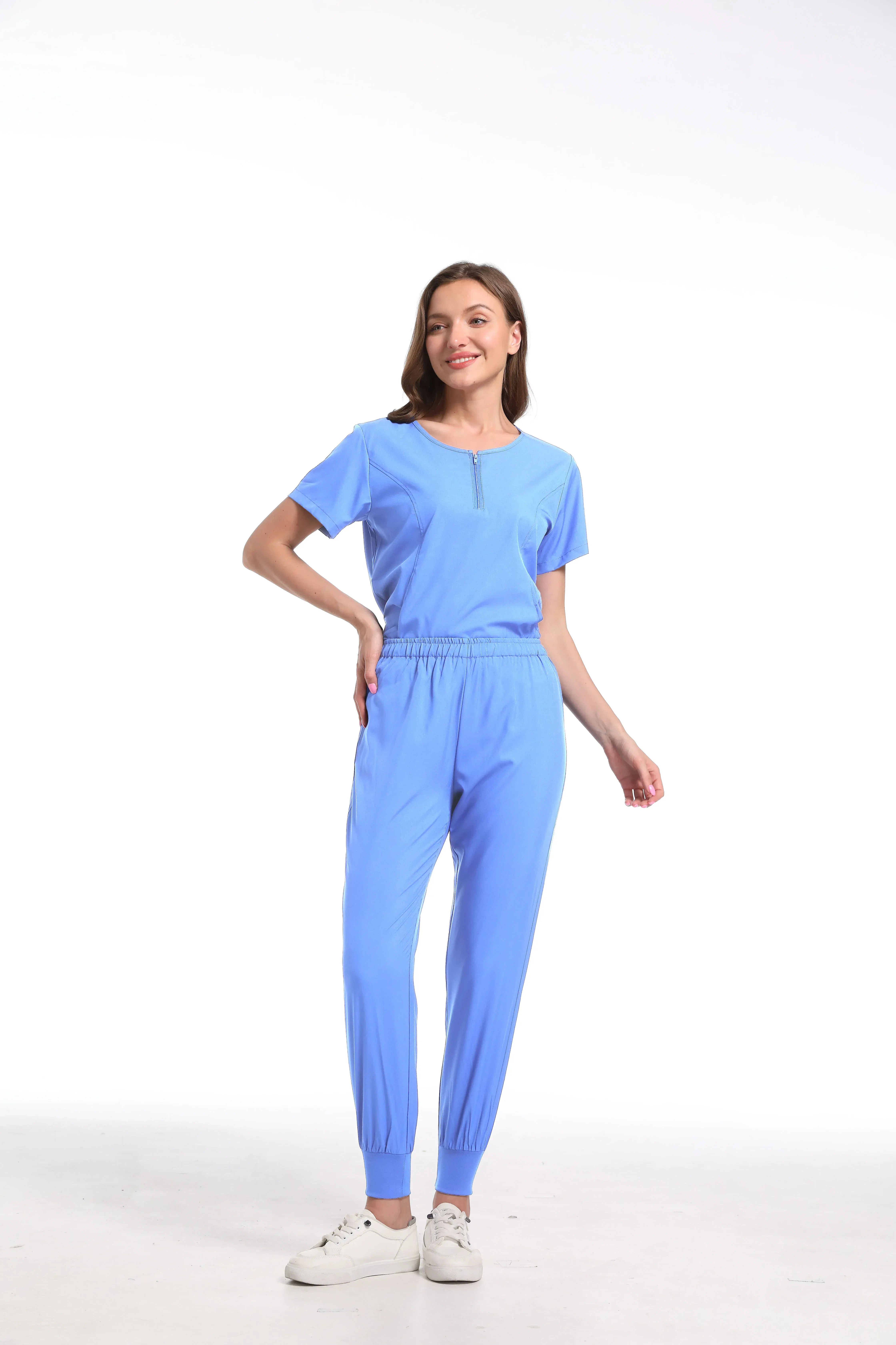 Uniformi mediche unisex Uomo Donna Abbigliamento infermieristico Costume di bellezza Infermiera Scrub Set Dottore Dentista Abbigliamento da lavoro Clinico Top Pantaloni