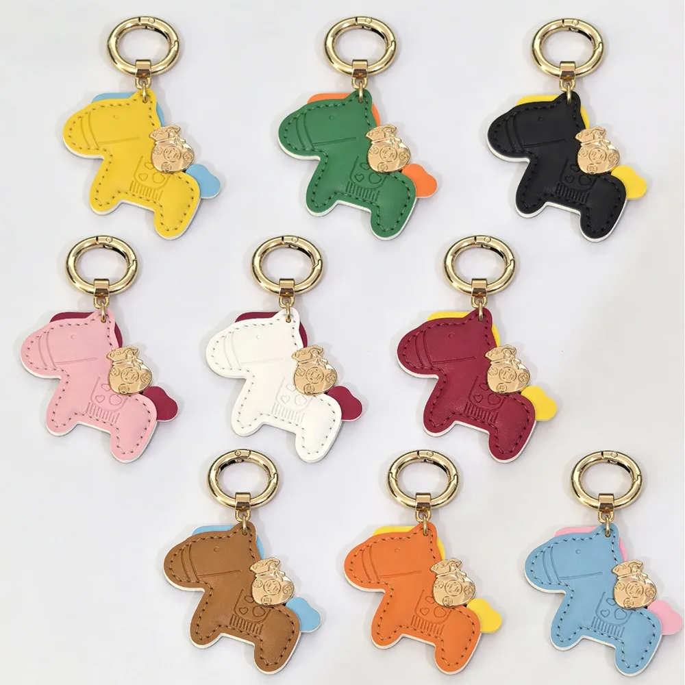 Porte-clés en cuir PU cheval mignon pour femmes, dessin animé argent sur cheval porte-bonheur, sac tendance, porte-clé de voiture, accessoires cadeaux