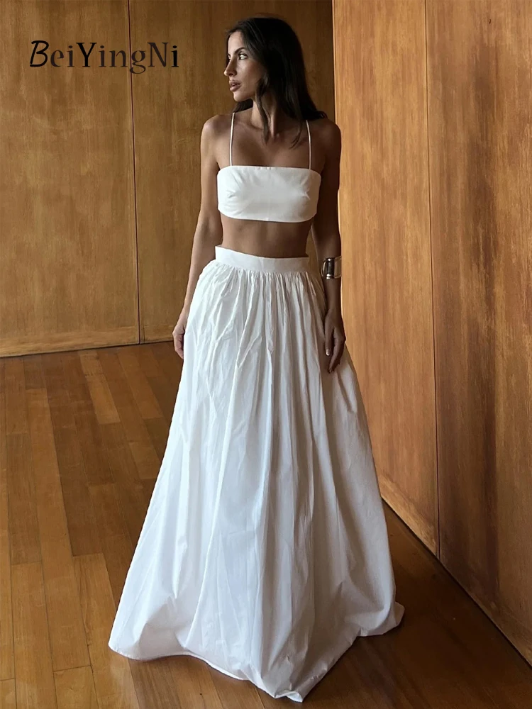 

Beiyingni Новые женские одинаковые комплекты, хлопковые летние сексуальные топы на бретелях + длинные макси-юбки трапециевидной формы, комплект из двух предметов, женский повседневный комплект 2025 г.