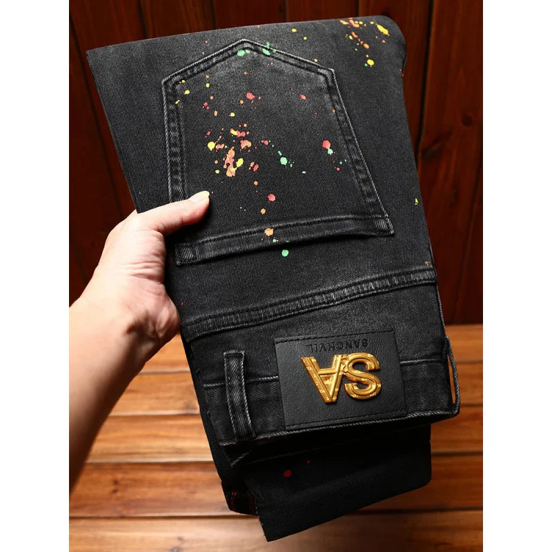 High end trendy black jeans for men, slim fit, elastic, perforated patch, paint printed, trendy street style small leg pants