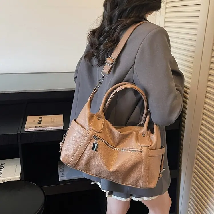 

2026 New Tote Bag Large Capacity Women's Korean Edition Premium Retro Versatile Leisure Travel Handheld Shoulder Bag
