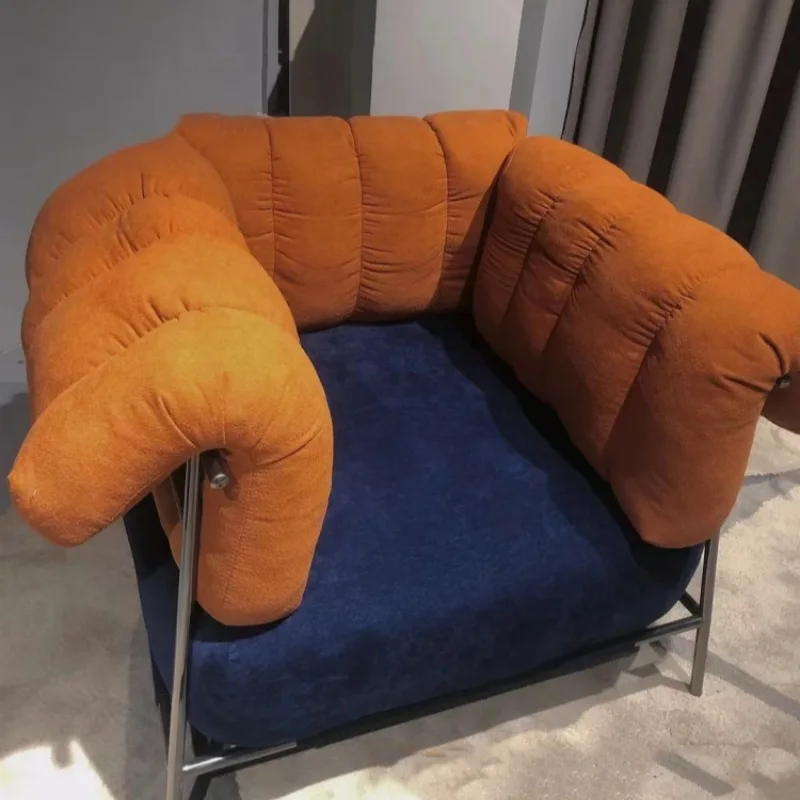 

Italian minimalist casual single chair Nordic light luxury wabi-sabi wind creative designer metal fabric color matching armchair