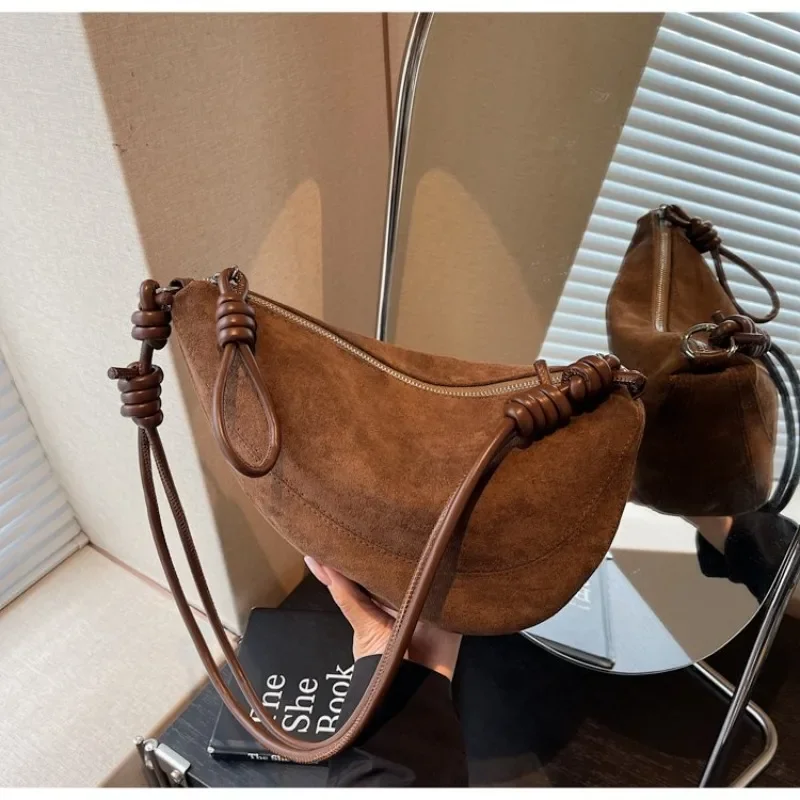 

Luxury Minimalist Handbag For Ladies As A Shoulder And Crossbody Bag With Solid Color And Letter Logo As A Chic Diaper Bag