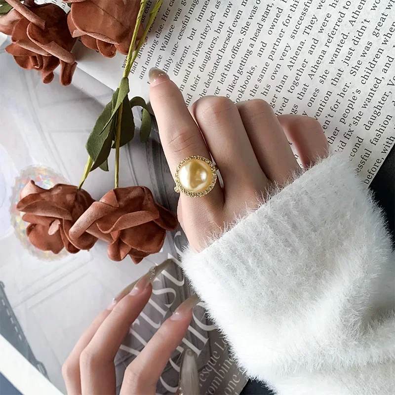 

Новое элитное ювелирное изделие: роскошное кольцо для женщин с инкрустацией, покрытие из платинированной меди, жемчуг, круглое, простое, 14 мм.