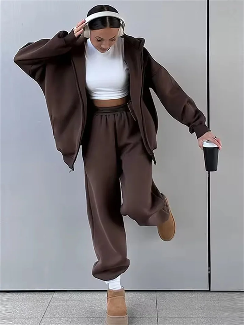 طقم بدلة رياضية نسائية غير رسمية على الموضة سويت شيرت بقلنسوة طقم مكون من قطعتين 2025 ملابس رياضية فضفاضة بخصر مطاطي بنطلون للجري للسيدات #1
