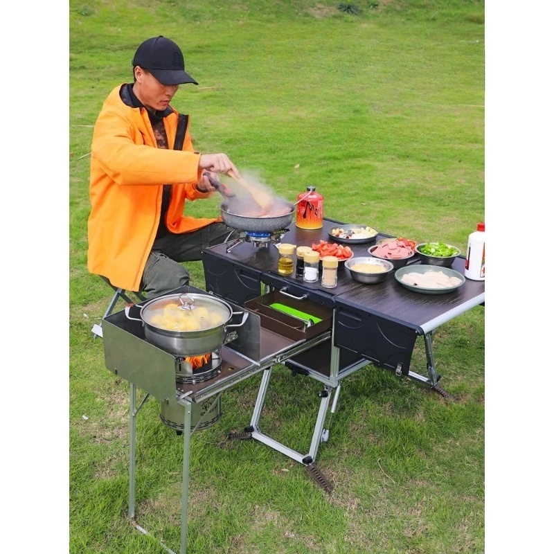 

A full set of outdoor camping picnic equipment, boiler tables and chairs, self-driving tour, mobile kitchen