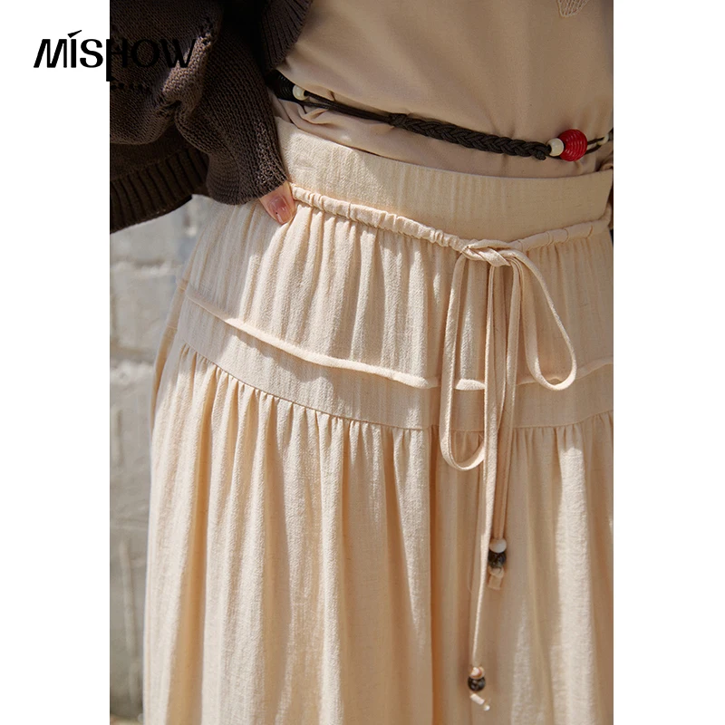 MISHOW Women's Solid Elastic High Waist Skirts  2026 Autumn Drawstring Pleated Flowy Skirt A-Line Midi Long Skirt MXF41B2573