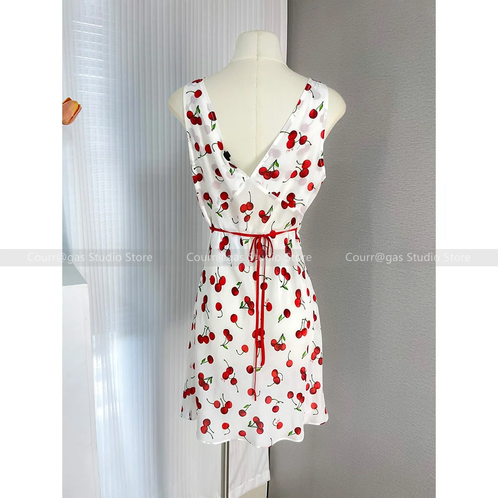 French niche fashion hottie sleeveless white V-neck silk cherry dress short female