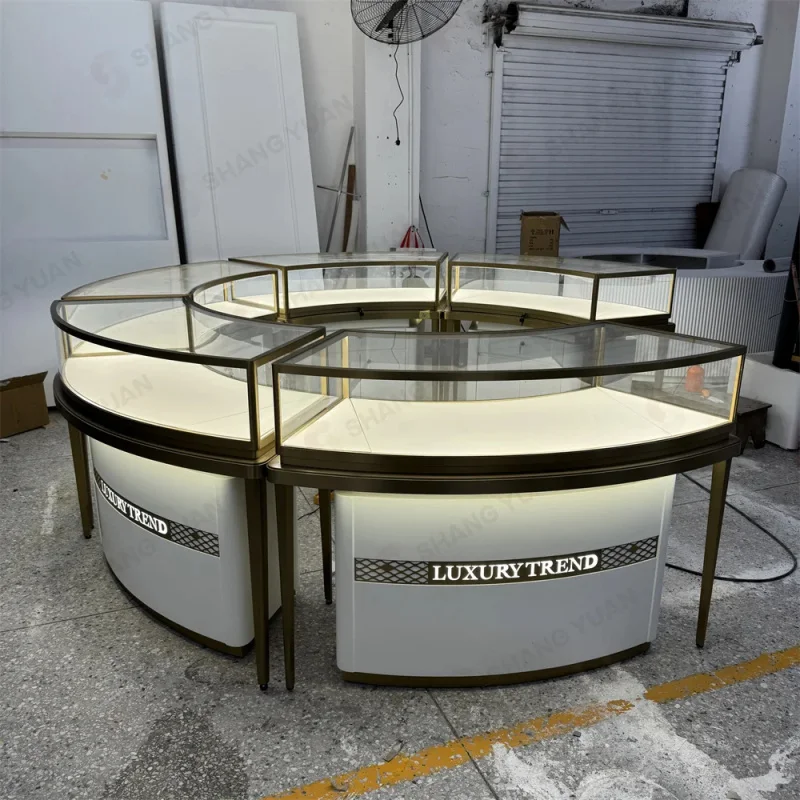 custom.Circular Jewelry Display Kiosk Luxury PVD Gold Metal Elegant Retail Visual Merchandising Bespoke Design Factory
